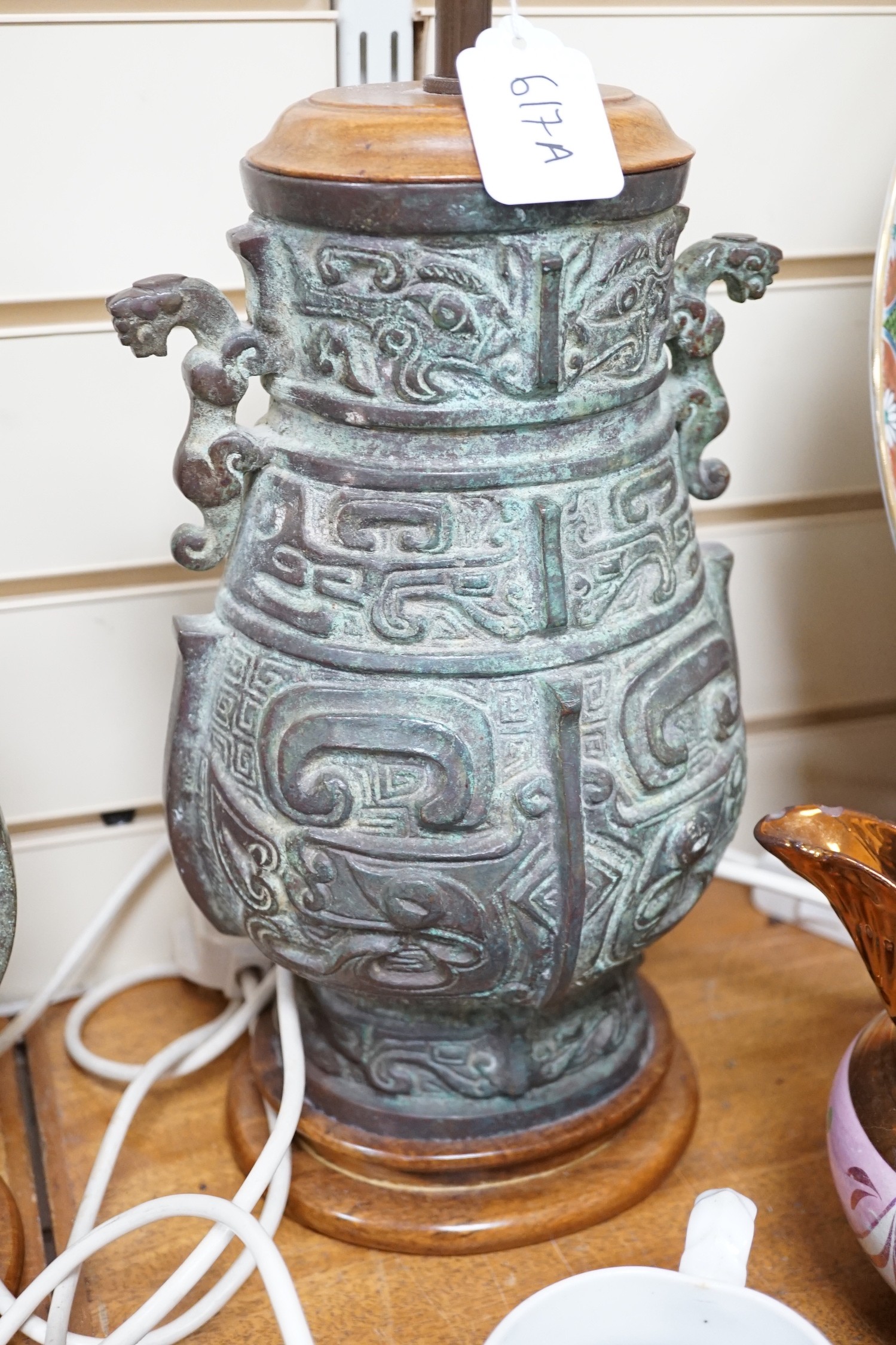 A pair of Chinese archaistic bronze ‘hu’ telescopic table lamps
